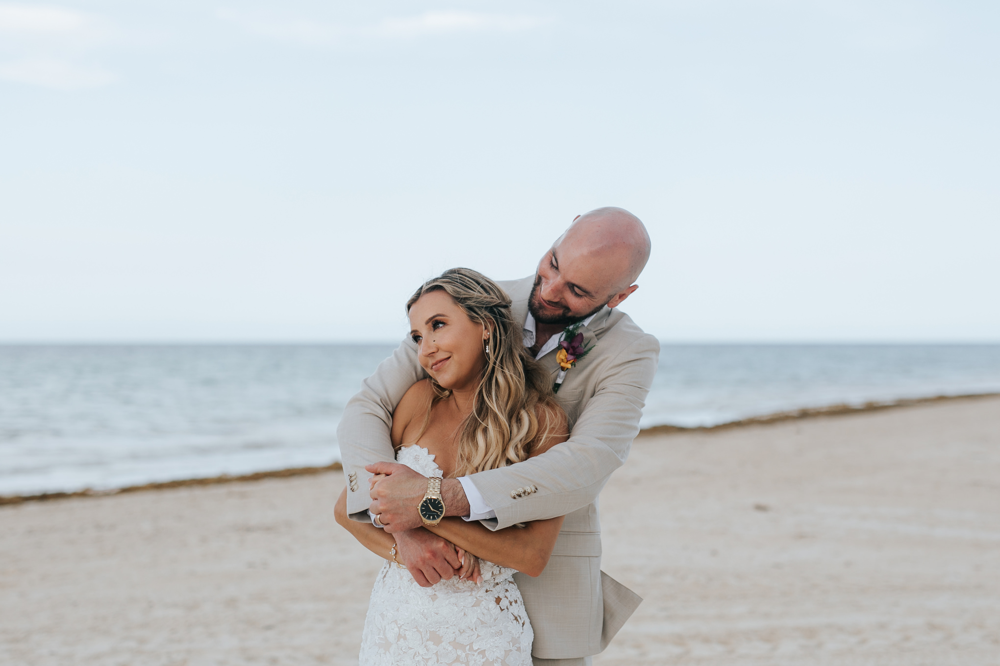 Couple embracing on the beach